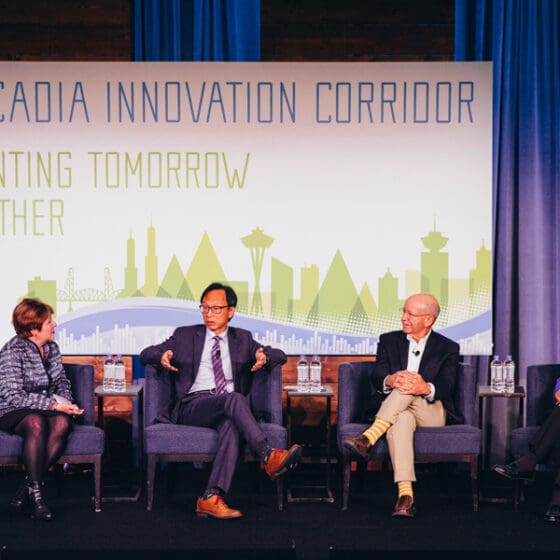 Lisa Brown, Director of the WA State Department of Commerce, moderates a panel with Canadian Senator Yuen Pau Woo (BC), U.S. Congressman Peter DeFazio (OR), and U.S. Congresswoman Suzan DelBene (WA) at the 2019 annual conference.